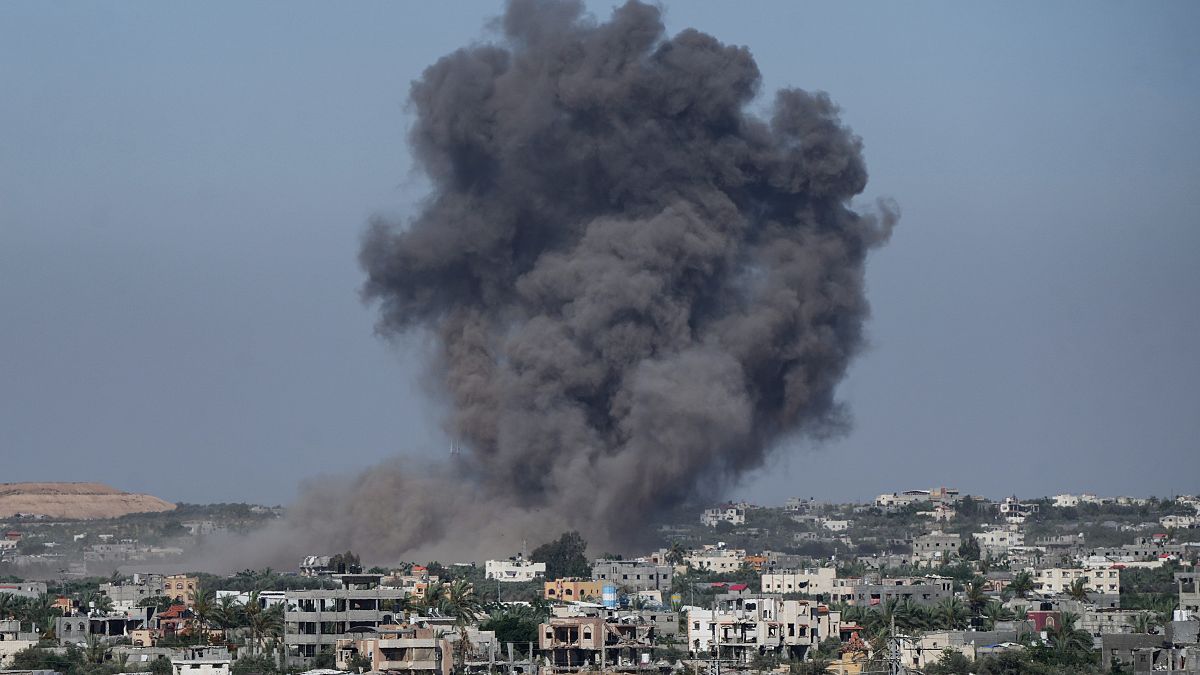 Smoke rises following an Israeli airstrike in Rafah, Gaza Strip.