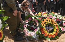 Mourners attend the funeral of Michel Nisenbaum, who was killed during Hamas' Oct. 7 attack and whose body was taken into Gaza, in Ashkelon, Israel, on Sunday, May 26, 2024. 