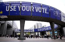 People wait in line to visit the European Parliament during Europe Day celebrations in Brussels on May 4, 2024.