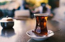 A cup of Turkish tea in a traditional ince belli (which literally translates to "slim-waisted") glass