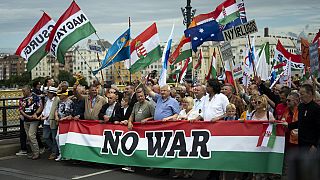 People march during a rally in support of Hungary's Prime Minister Viktor Orbán and his party in Budapest, Hungary on Saturday, June 1, 2024. (AP Photo/Denes Erdos)