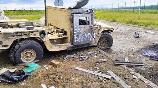 A damaged armored military vehicle is seen after fighting in Russia's western Belgorod region on Tuesday, May 23, 2023.