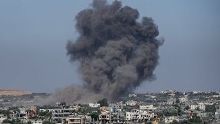 Smoke rises following an Israeli airstrike in Rafah, Gaza Strip.