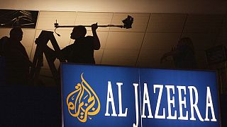 Workmen put the finishing touches on the media skybox for the Al-Jazeera satellite news channel inside Madison Square Garden in New York  (AP Photo/Charlie Neibergall)