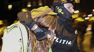 In this image taken from video Police arrests some 125 activists as they broke up a pro-Palestinian demonstration camp at the University of Amsterdam, the Netherlands 