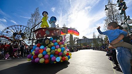 Joy and Sadness from Inside Out during the "Better Together: A Pixar Pals Celebration!" parade inside Disney California Adventure in Anaheim, Calif, on Wednesday, April 24, 20