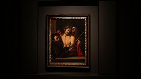 "Ecce Homo" (Latin for Behold The Man) by Michelangelo Merisi da Caravaggio is unveiled to the public for the first time in Spain's Prado Museum in Madrid on Monday, May 27