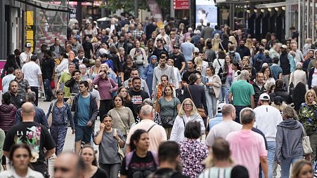 People walking the main shopping street in Dortmund, Germany.